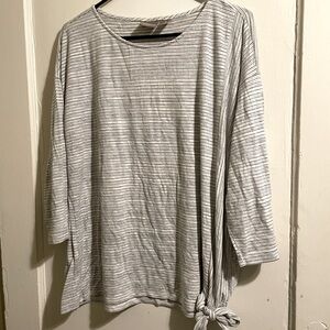 Woman’s size 3 Chico striped shirt.